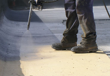 Coating systems over Omaha spray foam roof systems